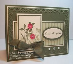 a thank you card with some flowers on it