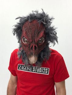 Zagone Studios Vulture mask is comfortable and has great moving-mouth action. When what you need is more doom and gloom, also a great law firm mascot! Latex sits on top of a cotton spandex head sock for comfort and movement. Perfect for theater, cosplay, Halloween and haunted houses. Handmade in the USA! Red Full Face Mask For Masquerade, Full Face Red Mask For Masquerade, Novelty Red Masks And Prosthetics For Halloween, Red Full Face Cosplay Masks And Prosthetics, Red Horror Mask, Horror Red Mask, Red Full Face Mask For Cosplay, Full Face Red Mask For Cosplay, Horror Red Masks And Prosthetics For Costume Party