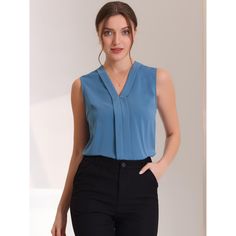 This elegant work blouse featuring a sleeveless design, and a v-neck has a basic style. You can pair this blouse with a variety of skirts, jeans, leggings, sneakers, or heel sandals to complete a casual look. This satin blouse with v neckline has a subtle texture with a solid color for a professional woman look. The soft and smooth fabric ensures all-day comfort. Skirts Jeans, Jeans Leggings, Satin Blouse, Professional Women, Work Blouse, Basic Style, Blue Blouse, Heel Sandals, Sleeveless Blouse