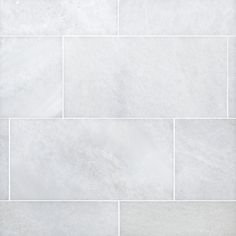 a white tile wall that is very clean and ready to be used as a background