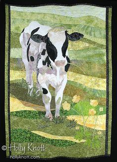 a quilted picture of a cow in a field with yellow flowers and green grass