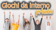 four children with their hands up in the air and text reading giochi da interno per bombini