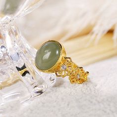 Cocktail Ring-Natural chalcedony egg-faced green rings for women elegant Chinese style charm light luxury ladies opening adjustable jewelry Style: Classic Side Stone: CRYSTAL Shape\pattern: PLANT Setting Type: Tension Setting Rings Type: Cocktail Ring Occasion: Party Model Number: MA075 Metal Material: Silver plating Main Stone: Chalcedony Item Weight: 0.01 Item Type: Rings Gender: Women Fine or Fashion: Fine CertificateType: Third Party Appraisal Certificate Number:3256804277096032 Adjustable Elegant Jade Rings, Elegant Adjustable Green Opal Ring, Party Models, Tension Setting, Green Rings, Adjustable Jewelry, Crystal Shapes, Jewelry Style, Stone Crystal