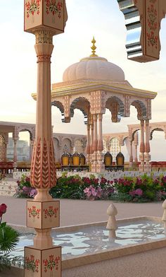 an elaborately decorated gazebo in the middle of a flower garden