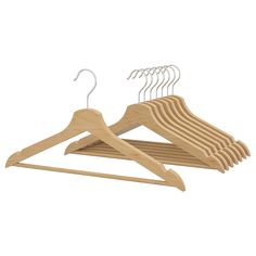 wooden clothes hangers with clips on white background