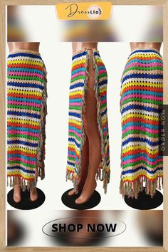 the skirt is crocheted with multicolored yarn and has fringes on it