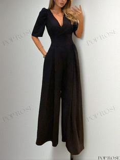 Poprose - Vibrant Neckline Wide-Legged Jumpsuit for Summer Elegant V-neck Elastane Jumpsuit Or Romper, Versatile Black V-neck Jumpsuits And Rompers, Elegant V-neck Jumpsuit With Button Closure, Black High Stretch V-neck Jumpsuits And Rompers, Black V-neck Jumpsuit With Pockets, Summer Black, Sleeveless Jumpsuits, Wide Leg Jumpsuit, Fall Outfits