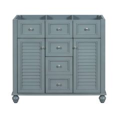 a gray cabinet with drawers and two doors