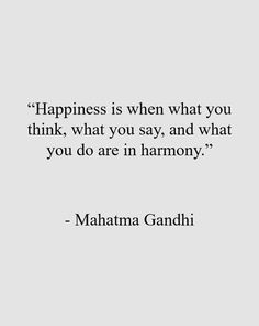 maha gandhi quote about happiness on white background with black and white image in the middle