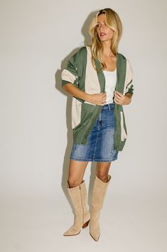 this flowy green + cream cardigan will add a trendy touch to any spring outfit. it has a relaxed longline silhouette + features a mod checkered color block pattern. the perfect lightweight green cardigan to wear anywhere from work lunches to casual dinner dates. green + natural // v-neckline, drop shoulder, buttons paired with our lotti tank + hillary cargo skirt // denim model is 5'8" + wearing a small measurements are approximate + taken while laying flat small : bust 44” length 29” medium : b Work Lunches, Color Block Pattern, Dinner Dates, Cream Cardigan, Color Block Cardigan, Skirt Denim, Green Cardigan, Cargo Skirt, Block Pattern