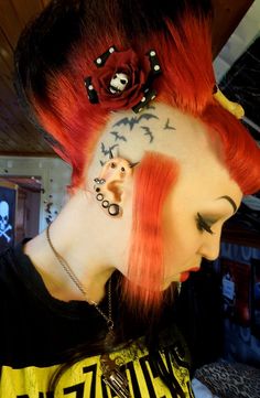 If a deathhawk and a beehive did it in a back alley, this badass baby would be the result! Bat tattoos on head Side Head Tattoo, Bat Tattoos, Bats Tattoo Design, Gothic Hairstyles, Bat Tattoo, Goth Hair, Alt Girls