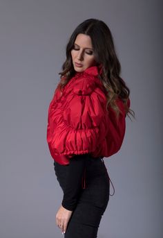 "Red Vest, Puffer Jacket, Women Jacket Stay warm and stylish in this cropped puffer women's vest with short sleeves. Choose your lucky color and elevate your spring style with this extravagant oversized red jacket! This red puffer coat has a high neck and padding, which will secure comfort during chilly days. - oversized look - custom size plus size available at NO EXTRA CHARGE - just convo me or write your measurements at checkout 🌀 Materials & Care 100% Polyester; Padding Hand washes insi Spring Puffer Windbreaker With Long Sleeves, Spring Long Sleeve Puffer Windbreaker, Long Sleeve Nylon Winter Top, Long Sleeve Nylon Top For Winter, Winter Nylon Cropped Jacket With Long Sleeves, Hooded Nylon Top For Winter, Hooded Nylon Tops For Winter, Winter Hooded Nylon Tops, Puffer Jacket Plus Size