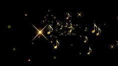 music notes are flying in the air with gold stars and sparkles on black background