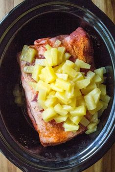 the food in the bowl is prepared and ready to be put into the slow cooker