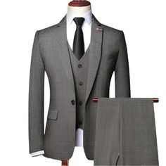 Embrace classic elegance with the Retro Plaid Men’s Suit - Slim Fit Business Formal from Guocali . This plaid suit combines luxury men’s suits craftsmanship with modern style, perfect for any professional setting. Made from a premium blend of polyester and viscose, the Retro Plaid Men’s Suit ensures both comfort and sophistication. Its slim fit design offers a contemporary look, while the single-breasted closure and zipper fly add a polished touch. Whether for business meetings or formal events, this high-end men’s suit is a versatile choice. Elevate your wardrobe with this designer suit for men, and command attention with its timeless style. The expert tailoring guarantees you look sharp and stylish, making a strong impression wherever you go. Suit Features: Retro Plaid Men’s Suit: Classi Professional Office Sets In Suiting Fabric, Classic Gray Business Sets, Fitted Gray Business Sets, Gray Three-piece Suit For Semi-formal Occasions, Slim Fit Three-piece Suit For Business, Classic Business Suiting Fabric Sets, Classic Business Sets In Suiting Fabric, Gray Groom's Suit, Single Breasted Suit And Tie Accessories For Business