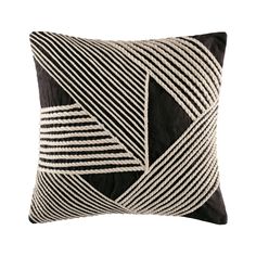 a black and white pillow with lines on it