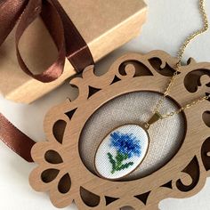 Dainty cornflower necklace is a wonderful gift for romantic women. Jewelry embroidery pendant with small flower is a wonderful gift for wife, mother or daughter. The floral necklace is suitable for every day and for a special occasion. This jewelry perfect accessory for complete your summer look. This pendant is made in the technique of micro-embroidery cross stitch on cotton canvas with cotton threads.  The size of each cross stitch is less than 1 mm. MATERIALS: The color of the base and chain- Handmade Flower Pendant Necklace For Mother's Day, Dainty Handmade Flower Necklace For Her, Dainty Handmade Flower Necklace For Mom, Delicate Flower Pendant Necklace As Gift, Dainty Flower Pendant Necklace As Gift, Dainty Handmade Flower Necklace As Gift For Her, Dainty Handmade Flower Necklace As Gift For Mom, Handmade Delicate Flower Necklace For Mother's Day, Delicate Handmade Flower Necklace For Mother's Day