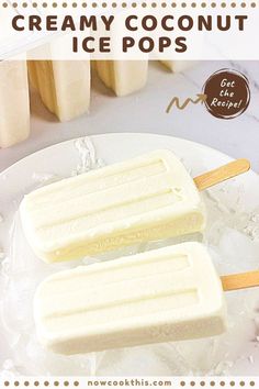 two ice pops are sitting on a white plate with text overlay that reads, creamy coconut ice pops