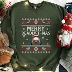 Celebrate the holiday season with some serious gains! The "Merry Deadlift-Mas Ugly Christmas Sweater" is the perfect holiday gift for all the weightlifting fanatics, gym bros, and deadlift maniacs who love spreading holiday cheer while staying strong. This hilarious Christmas sweater features a buff Santa Claus deadlifting, bringing together the festive spirit with a passion for fitness. Whether you're a gym regular, a CrossFit enthusiast, or just someone who enjoys hitting the weights, this ugl Staying Strong, Personal Trainers, Custom Sweatshirts, Sweatshirt Christmas, Fitness Studio, Limassol, Baby Bag, Christmas Sweatshirts, Ugly Christmas