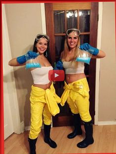 two women dressed in yellow and blue are standing next to each other with their hands on their hipss