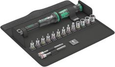 an assortment of screwdrivers and tools in a case