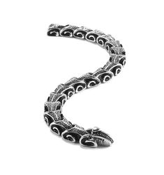 Maya is a striking and symbolic accessory that transcends ordinary style. This captivating piece, bathed in Antique Black, draws inspiration from the mystical symbolism of a serpent devouring its tail, creating an extraordinary blend of elegance and mystique. Hand-crafted with precise attention to detail, the Maya bracelet emulates the sinuous form of a snake, coiled intricately around the wrist. The Antique Black finish adds a touch of mystery and sophistication, making it a statement piece for Spiritual Snake-shaped Metal Jewelry, Engraved Metal Snake-shaped Jewelry, Spiritual Metal Jewelry In Snake Shape, Black Metal Snake-shaped Jewelry, Elegant Black Snake-shaped Jewelry, Unique Black Snake-shaped Jewelry, Elegant Adjustable Dragon Design Jewelry, Elegant Adjustable Jewelry With Dragon Design, Elegant Snake-shaped Metal Jewelry