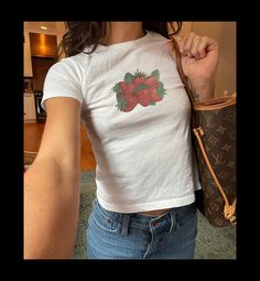 CHRISTMAS 2024: TUESDAY DECEMBER 10TH IS THE LAST DATE AN ITEM CAN BE ORDERED FOR GUARANTEED DELIVERY BY CHRISTMAS. 🍓 Show your love of strawberries with this classic baby tee.  🐔 FEATURES 🐔 ★ 100% USA Cotton (dark heather color is 50% cotton/50 % poly) ★ Heavyweight fabric (5.3 oz/yd²)  ★ Ribbed knit crew neck ★ Double-stitched collar, sleeves & hem ★ Shoulder-to-shoulder taping ★ Preshrunk ★ 100% direct-to-garment printing ★ Tear-away label ★ Gildan tshirt style 5000B 🐎 Would you like to s Fitted Casual Tops With Strawberry Print, Fitted White Tops With Strawberry Print, Fitted Short Sleeve Tops With Fruit Print, Y2k Style Fruit Print Short Sleeve Tops, Retro Strawberry Print Tops For Summer, Casual Fitted Strawberry Print Tops, Y2k Fruit Print Short Sleeve Tops, Fitted White Top With Strawberry Print, Fitted Strawberry Print Short Sleeve Tops