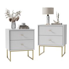 two white nightstands side by side with flowers on top