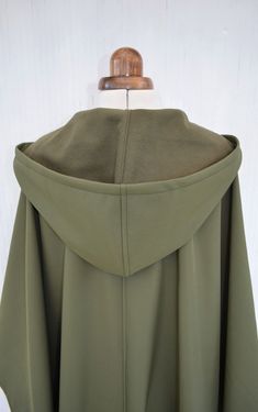 Waterproof and Windproof Cape Coat Green Hooded Cloak | Etsy Solid Hooded Cape For Fall, Khaki Windproof Raincoat For Fall, Green Long Coat For Outdoor Wear, Green Long Coat For Outdoor, Hooded Green Cape For Fall, Green Hooded Cape For Fall, Green Winter Cape Outerwear, Khaki Hooded Raincoat With Adjustable Hood, Khaki Hooded Raincoat For Rainy Weather