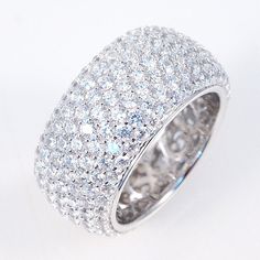 Each carefully selected cubic zirconia are inserted by hand individually by professional jewelers on pure sterling silver 925. The CZ'S in my jewelry are the highest grade in the world. You will not know that it is not a diamond. Once you buy a ZirconZ CZ, you will only want this quality. Gorgeous Color: Black, White, Yellow, Pink Material: Sterling Silver 925 Stone: Cubic Zirconia (CZ) - Signity Stone: Clear CZ Length: 10 mm Height: 3mm THIS RING IS A BIG RING WELL MADE WITH A FILLIGREE BACKING Fantasy Rings, Black Rose Ring, Silver Eternity Ring, Fine Gold Necklace, Luxurious Jewelry, Bling Ring, Jewelry Roll, Big Rings, Pave Ring