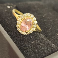 Beautiful Vintage Solid 14kt Yellow Gold Oval Cut Pink Topaz Ring With A Round Cut White Topaz Halo Around It. Ring Is A Size 6, And Has Been Acid Tested. It Is Also Stamped With The 14kt Stamp. Please See All Pictures Of The Ring. Pink Pearl Ring, Pink Topaz Ring, Pink Engagement Ring, Oval Cut Engagement Ring, Pink Topaz, Halo Ring, Pink Pearl, Halo Rings, Topaz Ring