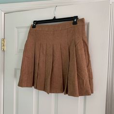 Corduroy Tennis Skort Size: Medium Color: Latte Brand: &Merci New W/ Tags! Pleated Brown Skort For Fall, Fall Pleated Brown Skort, Retro Fitted Brown Skort, Brown Pleated Cotton Skort, Brown Corduroy Pleated Skirt, Brown Pleated Short Skort, Brown Cotton Pleated Skort, Polka Skirt, Corduroy Lined Mini Skirt