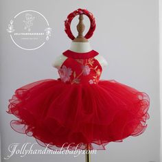 ♥ Introducing our exquisite handmade Chinese baby girl dress, a perfect blend of elegance and style designed for your little one. This stunning dress features a vibrant red bodice that beautifully contrasts with a delicate white tulle skirt, creating a charming and fashionable look suitable for any special occasion. The dress is thoughtfully designed with cool shoulder details that add a modern twist, while the pearl embellishments on the neckline provide a touch of sophistication and grace. Cra Elegant Sleeveless Tutu Dress For Festive Occasions, Elegant Christmas Tutu Dress In Tulle, Elegant Christmas Tulle Tutu Dress, Spring Festive Tulle Tutu Dress, Elegant Festive Tulle Princess Dress, Festive Sleeveless Tutu Dress Made Of Tulle, Red Organza Dress For Summer, Summer Red Organza Dress, Pink Elegant Tutu Dress For Festive Occasions