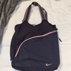 Never Used Nike Sports Bag. It Is Large In Size So A Lot Will Fit In The Bag Sporty Shoulder Bag For Daily Use, Sporty Everyday Backpack, Sporty Shoulder Bag For Everyday Use, Athleisure Sports Bag With Large Capacity, Sporty Gym Bag With Large Capacity For Workout, Sporty Large Capacity Gym Bag For Workout, Pink Gym Bag With Zipper For Daily Use, Pink Gym Bag With Zipper Closure For Daily Use, Pink Large Capacity Shoulder Bag For Gym