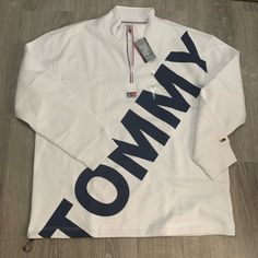 New And Never Used Tommy Hilfiger Denim Line White With Big Tommy Writing Trendy White Half-zip Top, White Fleece Top For Fall, White Fleece Half-zip Top, White Half-zip Sweatshirt For Spring, White Fleece Sweatshirt For Spring, Casual White Half-zip Sweatshirt, White Fleece Outerwear With Letter Print, White Half-zip Sporty Sweatshirt, White Half-zip Cotton Top