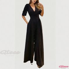 Qteee - Chic Belted High-Waisted Bubble Short-Sleeve Wide-Leg Jumpsuit for Casual Wear Party Bodysuit With Short Sleeves, Fitted One-piece Jumpsuits For Workwear, Stretch Jumpsuits And Rompers For Formal Occasions, Formal Stretch Solid Color Jumpsuits And Rompers, Solid Color Short Sleeve Bodysuit For Party, Elegant Short Sleeve Spring Bodysuit, Black Short Sleeve Jumpsuit For Party, Black Short Sleeve Jumpsuits And Rompers For Party, Chic Short Sleeve Party Bodysuit