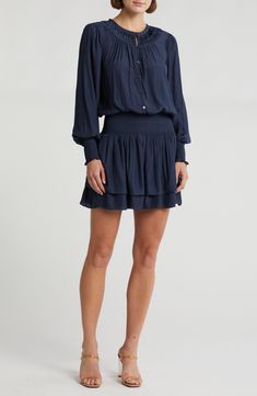 Exude polished style in a flowy long-sleeve dress fashioned with a shirred neckline, billowy sleeves and a smocked blouson waist. 35" length (size Small) Button half placket Crewneck Long sleeves with smocked cuffs 100% polyester Machine wash, line dry Imported Fall Mini Dress With Blouson Long Sleeves, Flowy Long Sleeve Dress With Smocked Back, Long Sleeve Mini Dress With Smocked Back, Flowy Long Sleeve Ruched Dress, Chic Long Sleeve Mini Dress With Smocked Back, Chic Long Sleeve Rayon Mini Dress, Elegant Long Sleeve Mini Dress With Smocked Back, Long Sleeve Viscose Mini Dress For Daywear, Viscose Long Sleeve Mini Dress For Daywear