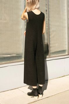 Same day shipping on Lauren Manoogian. Oversized, relaxed jumpsuit with an extra long dropped crotch and cropped a little shorter in the legs. 2 pockets at the front, sleeveless with a scooped neckline. Fabric is 80% cotton asnd 20% wool.