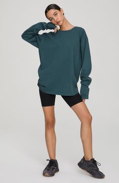 Let yourself lounge in the soft comfort of this oversized long-sleeve T-shirt with slouchy dropped shoulders and cut from breathable cotton. Crewneck Long sleeves 100% cotton Machine wash, tumble dry Imported Women's Clothing Black Owned and Founded Oversized Sporty T-shirt For Fall, Soft-washed Comfy Long Sleeve Tops, Oversized Long Sleeve Athleisure T-shirt, Comfortable Workout Tops For Fall, Comfortable Fall Workout Tops, Oversized Solid Activewear For Loungewear, Oversized Activewear For Loungewear, Oversized Cotton Long Sleeve Top For Everyday, Slouchy Long Sleeve Tops For Everyday