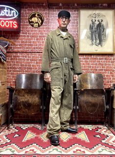 "Vintage WWII US Army 1st HBT model olive green utility garage mechanic coveralls jump suit outfit size 42R. Good used condition for the age, 13 stars buttons, multiples pocket on hip, chest and back, some stains and wear, check pictures. Made in Usa. Please, check carefully the measurements, photos and description of the article before buying it, we do not accept changes or returns. Measurements lying face down: (Model on the pics is 5.7 tall and 160 pounds weight.) 21\" Across chest underarm t Green Utility Jumpsuit With Long Sleeves, Khaki Long Sleeve Utility Overalls, Military Style Green Overalls With Pockets, Mechanic Jumpsuit Mens, Men’s Coverall Outfit, Green Long Sleeve Utility Jumpsuit, Military Style Long Sleeve Khaki Jumpsuit, Khaki Military Style Long Sleeve Jumpsuits, Military Green Overalls With Pockets