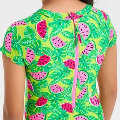 Update your child's swim wardrobe for the pool or beach with this Tropical Melon Fruit Printed One-Piece Rash Guard Swimsuit from Cat & Jack™. This cap-sleeve swimsuit features a pink melon print on a green palm leaf backdrop for a tropical vibe. Made from stretchy fabric for comfy movement in and out of the water, this rashguard swimsuit boasts a UPF 50+ rated construction that helps keep your kid shielded from the sun's UV rays. Plus, it's designed with a half-length back zipper for easy wear. Palm Leaf Backdrop, Leaf Backdrop, Melon Fruit, Sleeve Swimsuit, Rashguard Swimsuit, Fruit Print, Fabric Tape, Kids Outfits Girls, Tropical Vibes