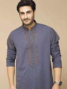 <ul> <li>Color: Light slate gray</li> <li>Prominent-looking kurta features embroidery detail on collar, sleeves, around placket and placket</li> <li>Complemented with matching shalwar</li> </ul> <p><br /><br /><strong>Additional Accessories:</strong><br />Peshawari Sandal: <strong>US$50</strong><br />Men's Shawl: <strong>US$50</strong></p> Cotton Traditional Wear With Embroidered Sleeves, Cotton Straight Kurta With Embroidered Sleeves, Cotton Kurta With Embroidered Sleeves For Eid, Cotton Set With Embroidered Sleeves For Eid, Festive Cotton Traditional Wear With Embroidered Sleeves, Semi-formal Long Sleeve Embroidered Kurta, Festive Gray Long Sleeve Sets, Traditional Gray Kurta For Eid, Gray Traditional Wear For Eid