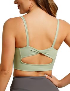 PRICES MAY VARY. Ultra Comfort Soft: ABOCIW Sports bra, made of 75% Nylon+25% Spandex, super soft lightweight fabric which is sweat-wicking, breathable and high elasticity. This kind of sports bra for women with super soft elastic band for comfort movement. Women’s crop tank top for light workout and reduce jiggle. Experience maximum support and comfort with our high impact sports bra designed specifically for women. Our women's sports bras flattering twisted back design and cutout create a stylish and unique look for this scoop neck workout top, perfect for women who want to stand out in the gym. Matching: Choose from a variety of colors, including white, to match your style. Our sports bra featured with wireless support and backless design, can shows your curved perfect match with yoga p Green Scoop Neck Sports Bra With Built-in Bra, Sleeveless Seamless Sports Bra For Pilates, Workout Top With Medium Bust Support In Seamless Fabric, Workout Top With Medium Bust Support, Green Sports Tank Top With Built-in Bra, Green Medium Support Sleeveless Sports Bra, Green Sleeveless Sports Bra With Medium Support, Green Sports Bra With Scoop Neck And Built-in Bra, Green Sports Bra With Built-in Bra And Scoop Neck