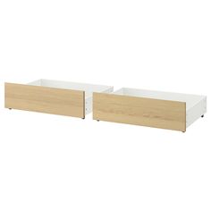 two white and wood drawers on top of each other