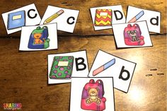 four cards with pictures of backpacks and letters that spell the word abc, b, c