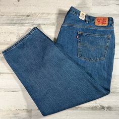 Elevate Your Wardrobe With These Levi's 550 Men's Big & Tall Relaxed Fit Denim Blue Jeans In Size 52x30. These Jeans Feature A Solid Pattern With A Zip Closure And Pockets. Made Of 100% Cotton, The Fabric Type Is Denim. The Jeans Are Machine Washable And Suitable For All Seasons, Whether It's Winter, Summer, Fall, Or Spring. Levi's 550 Men's Big & Tall Relaxed Fit Denim Blue Jeans Are A Part Of The Levi's 500 Series Product Line. These Jeans Are Ideal For Casual Outings And Can Be Paired With An Levi's Classic Big And Tall Bottoms, Classic Levi's Big And Tall Bottoms, Big And Tall Medium Wash Casual Bottoms, Big And Tall Dark Wash Straight Leg Jeans, Medium Wash Big And Tall Casual Bottoms, Big And Tall Casual Medium Wash Bottoms, Big And Tall Straight Leg Denim Jeans, Classic Blue Levi's Jeans, Big And Tall Casual Bottoms In Medium Wash