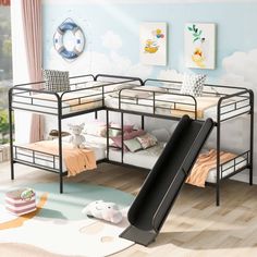 a child's bedroom with bunk beds and a slide