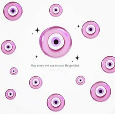 an image of many pink eyeballs in the middle of a circle with words on it