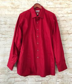 Van Heusen Men's Regular Fit Flex Collar Dress Shirt Red 18.5 34/35 55% cotton 45% polyester Great preowned condition. Pit to pit- 27” Shoulder to shoulder- 19.5” Shoulder to cuff- 24” Approx length- 33” Fitted Red Dress Shirt With Spread Collar, Red Fitted Dress Shirt With Spread Collar, Red Semi-formal Top, Semi-formal Red Shirt With Spread Collar, Red Spread Collar Shirt For Semi-formal Occasions, Red Semi-formal Shirt With Spread Collar, Red Semi-formal Button-up Shirt, Semi-formal Red Cotton Top, Red Cotton Semi-formal Top