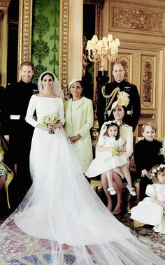 the royal family pose for a wedding photo